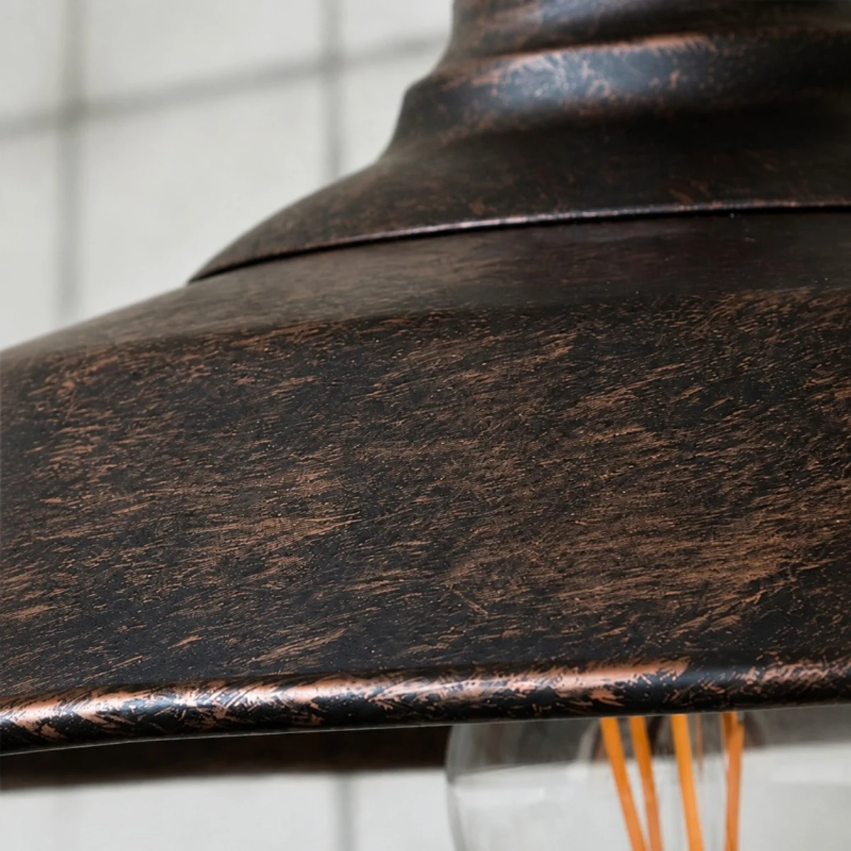 Weathered metal shade rim and finish detail