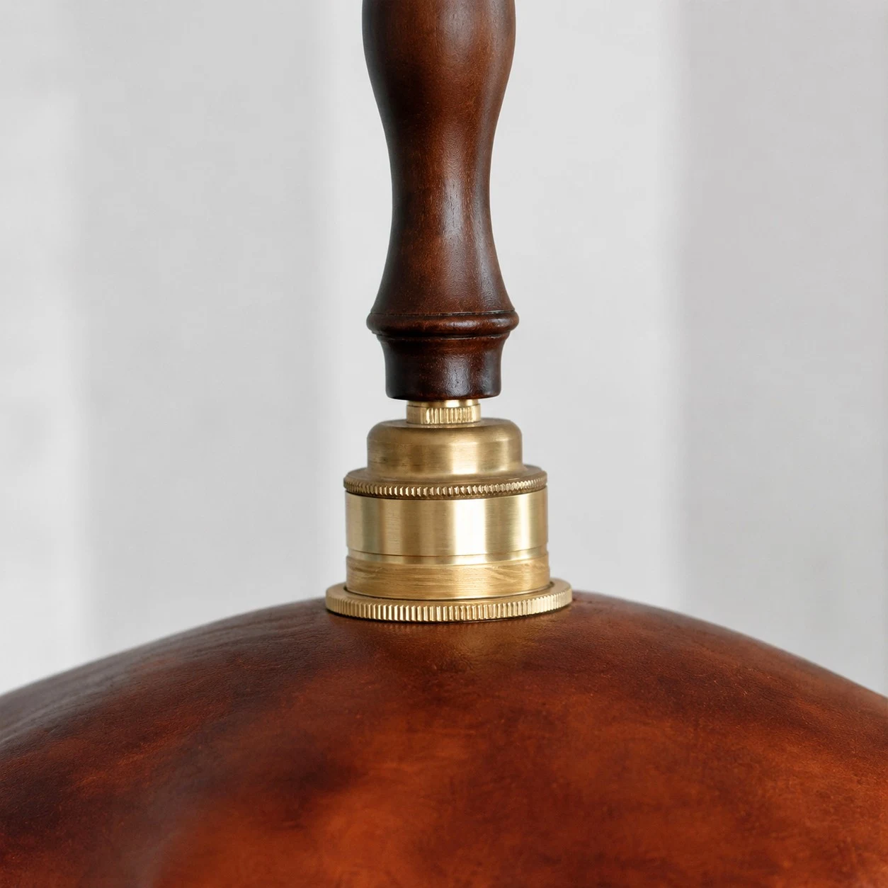 brass socket and distressed leather shade detail