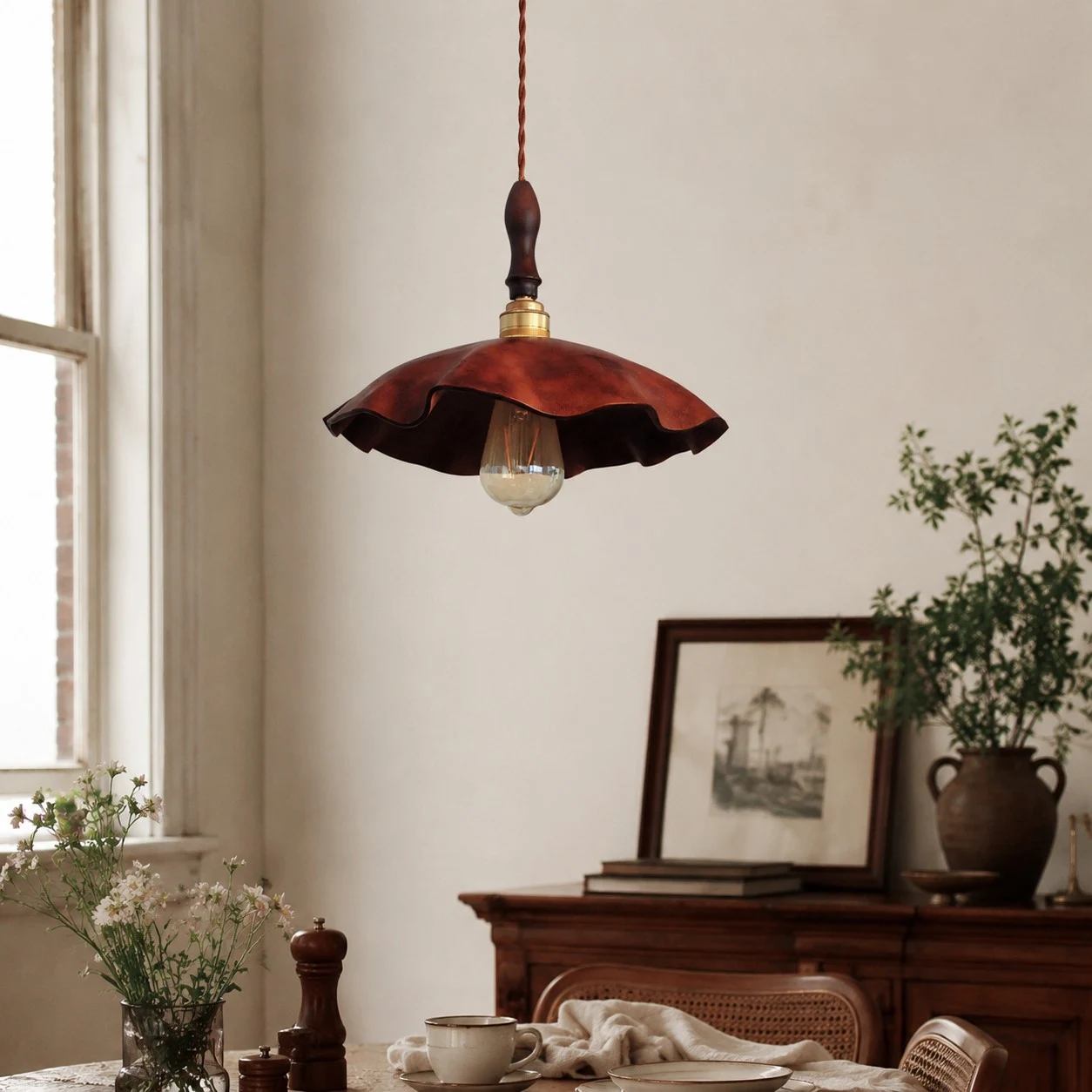 brown cowhide pendant light in a wabi sabi room setting