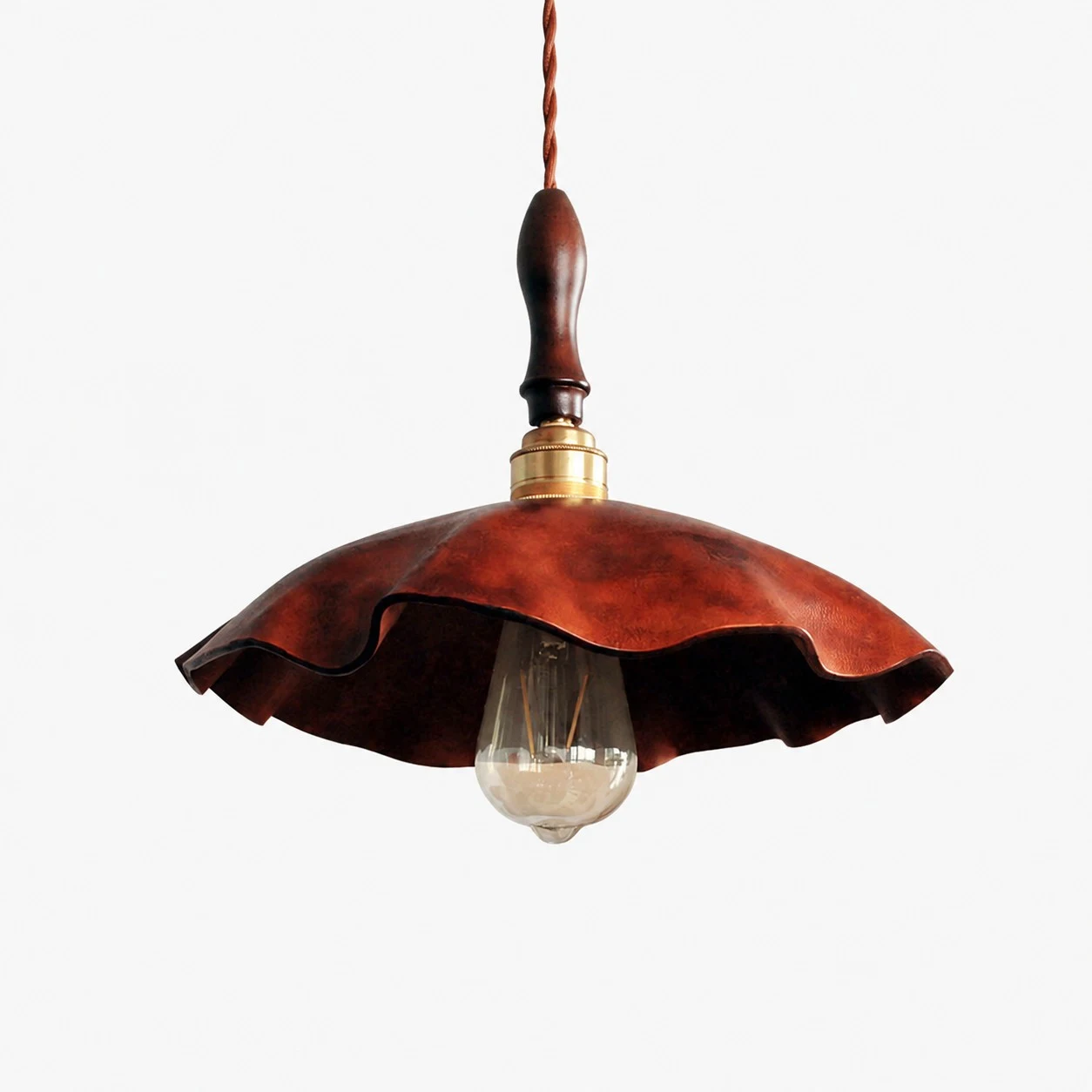 brown distressed cowhide pendant light with brass socket