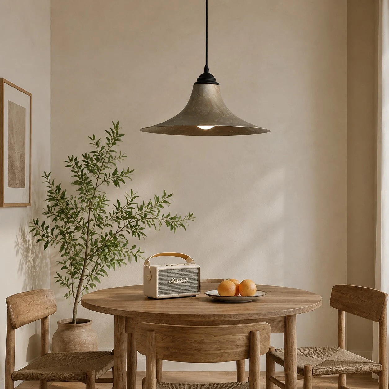 Black iron pendant lamp in a styled dining nook