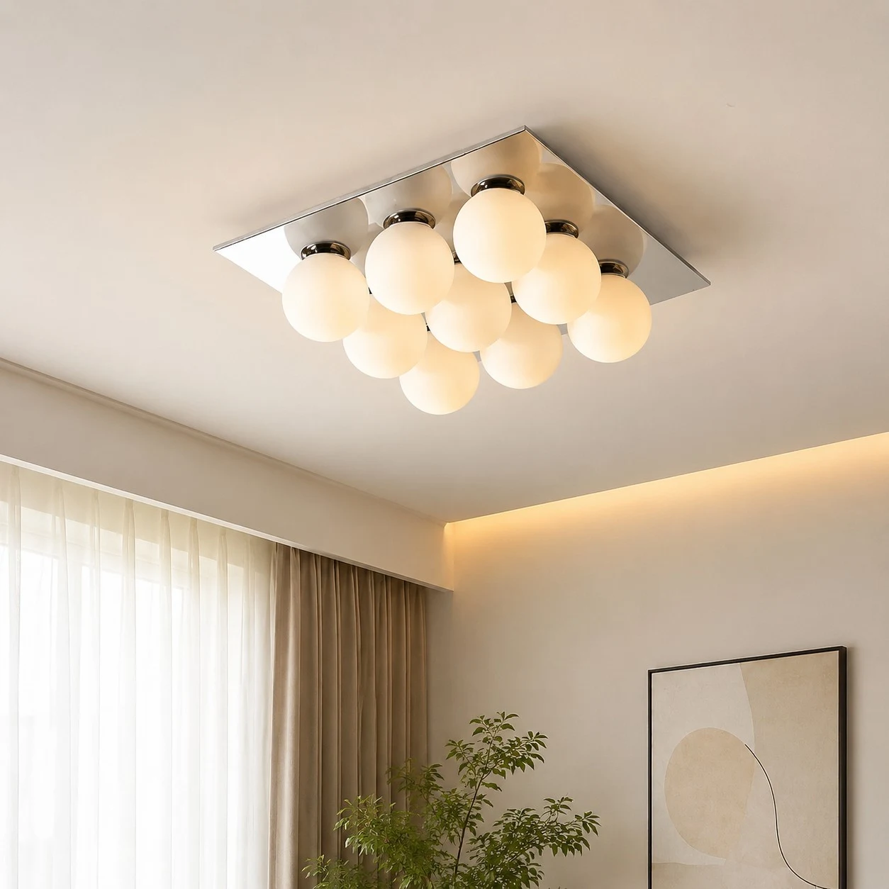 Main gallery image: chrome square ceiling light installed in a warm living room, lights on.