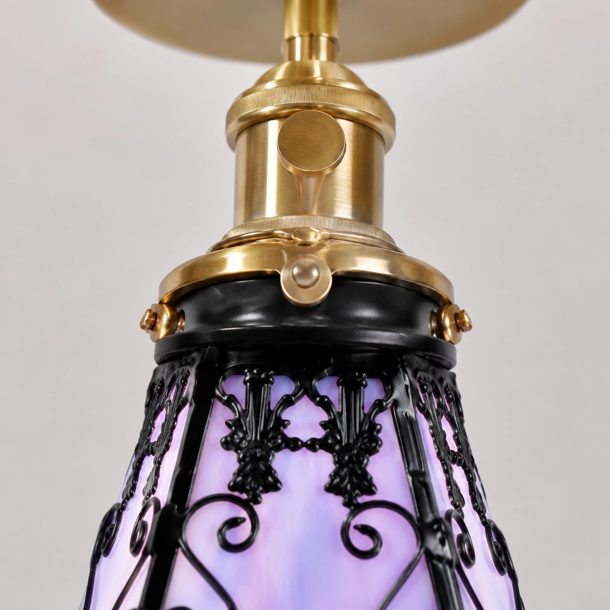 upper shade hardware and stained-glass join detail