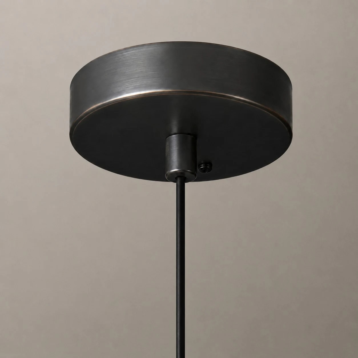 Black pendant shade edge and ceiling canopy detail