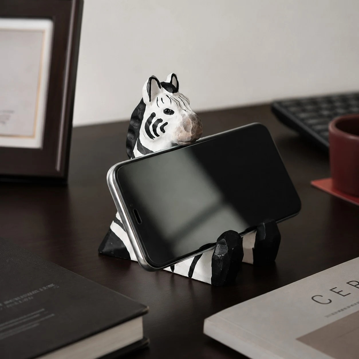 Wooden animal phone stand scene view