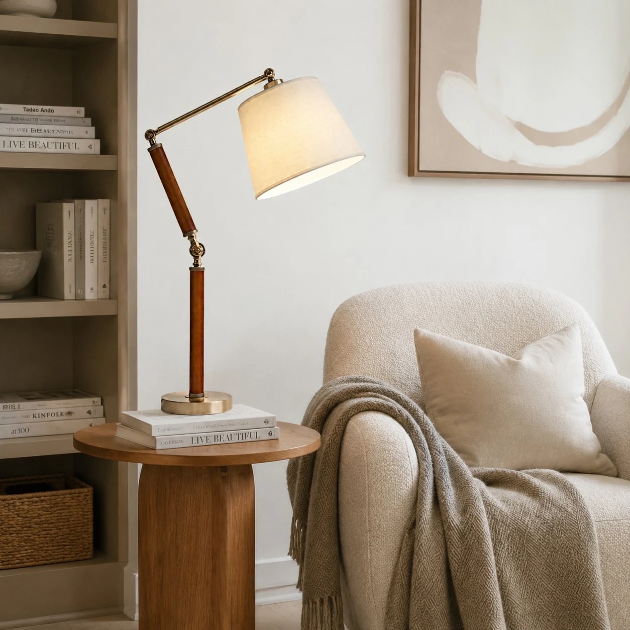 Adjustable wooden table lamp on a side table beside an armchair