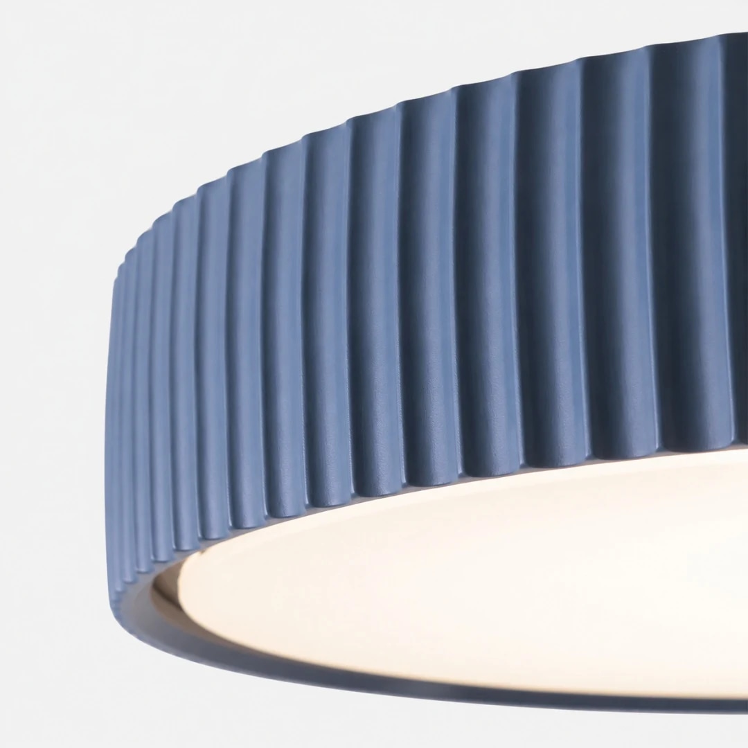 Close view of the blue ribbed acrylic and resin shade