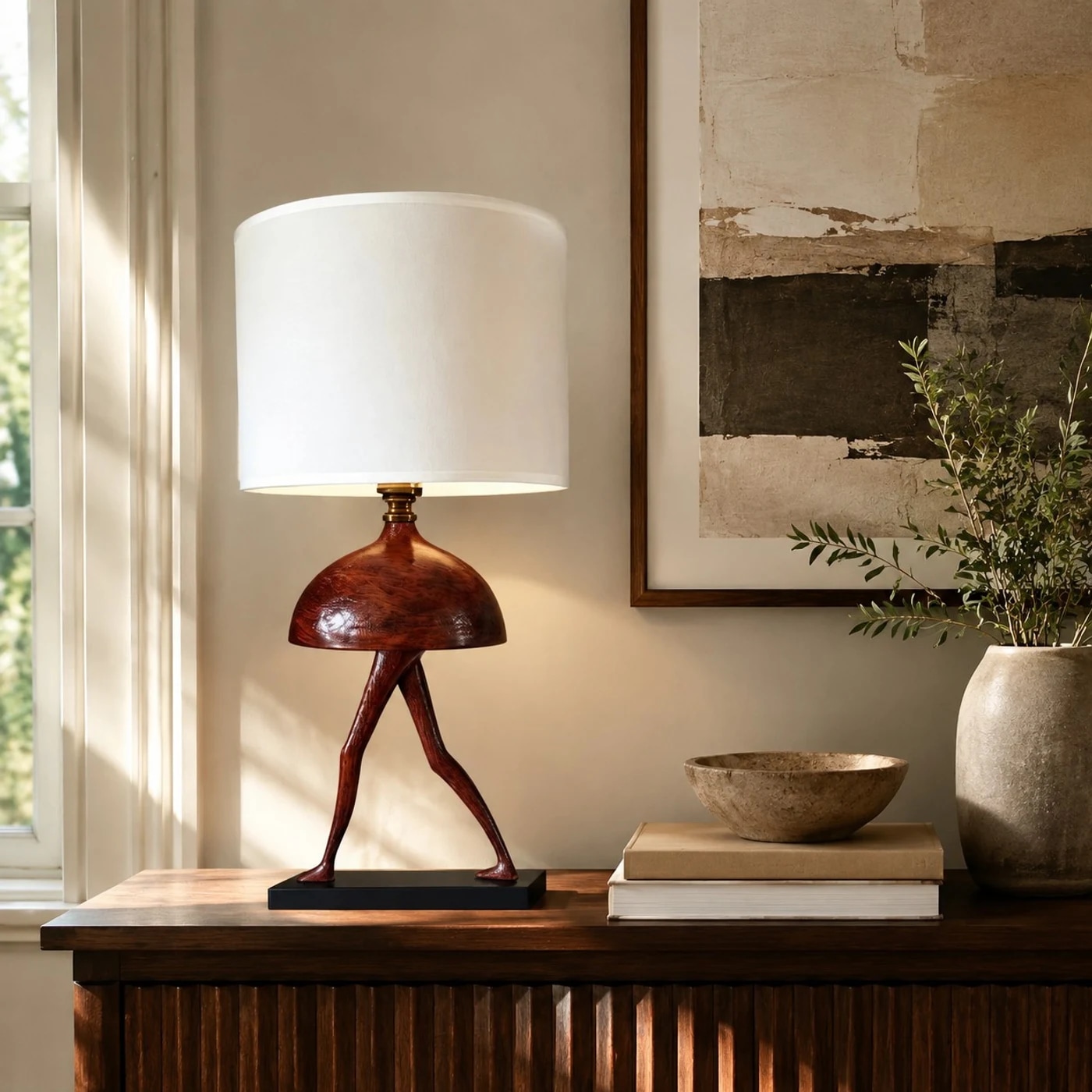 Table lamp on cabinet