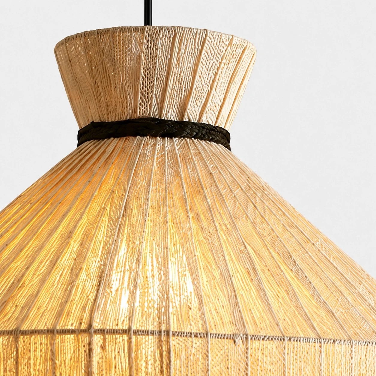 Close-up of top collar and black accent band on woven pendant shade