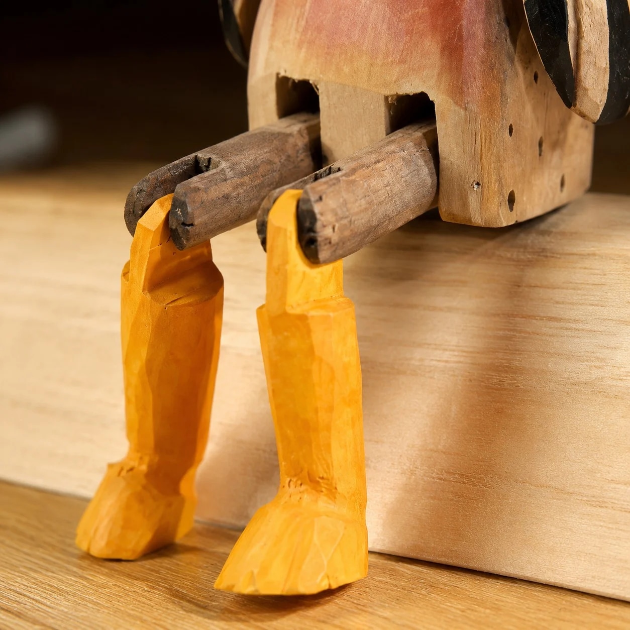 Wooden ornament styled on a tabletop edge