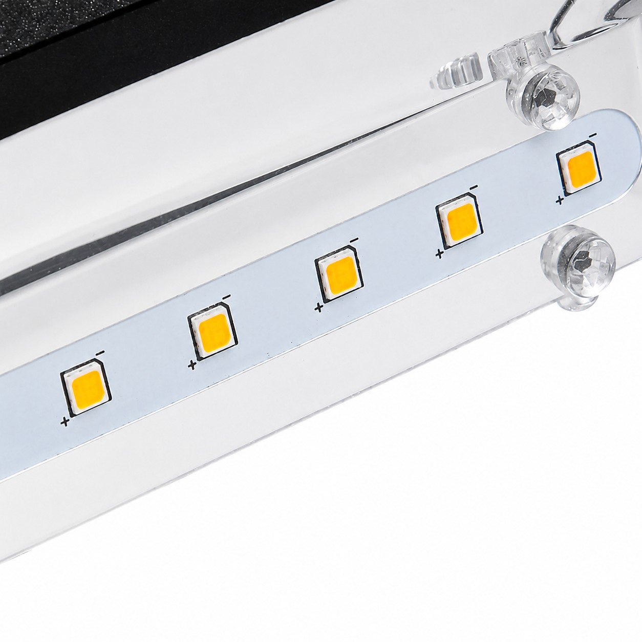 Close view of the LED module inside the black wall light