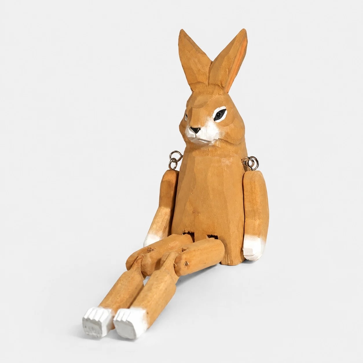 Hand-carved wooden rabbit ornament