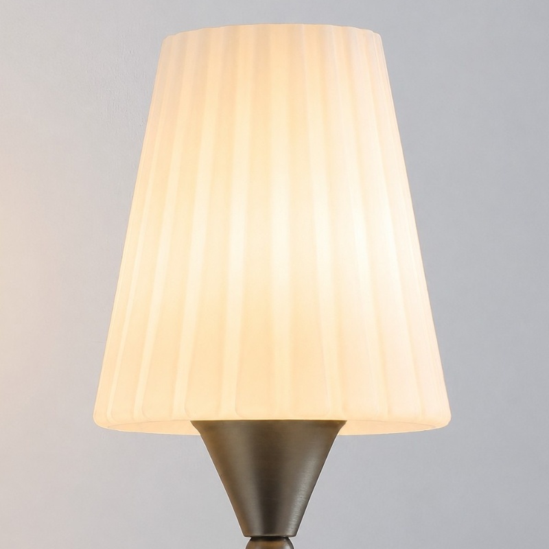Close view of pleated glass shade