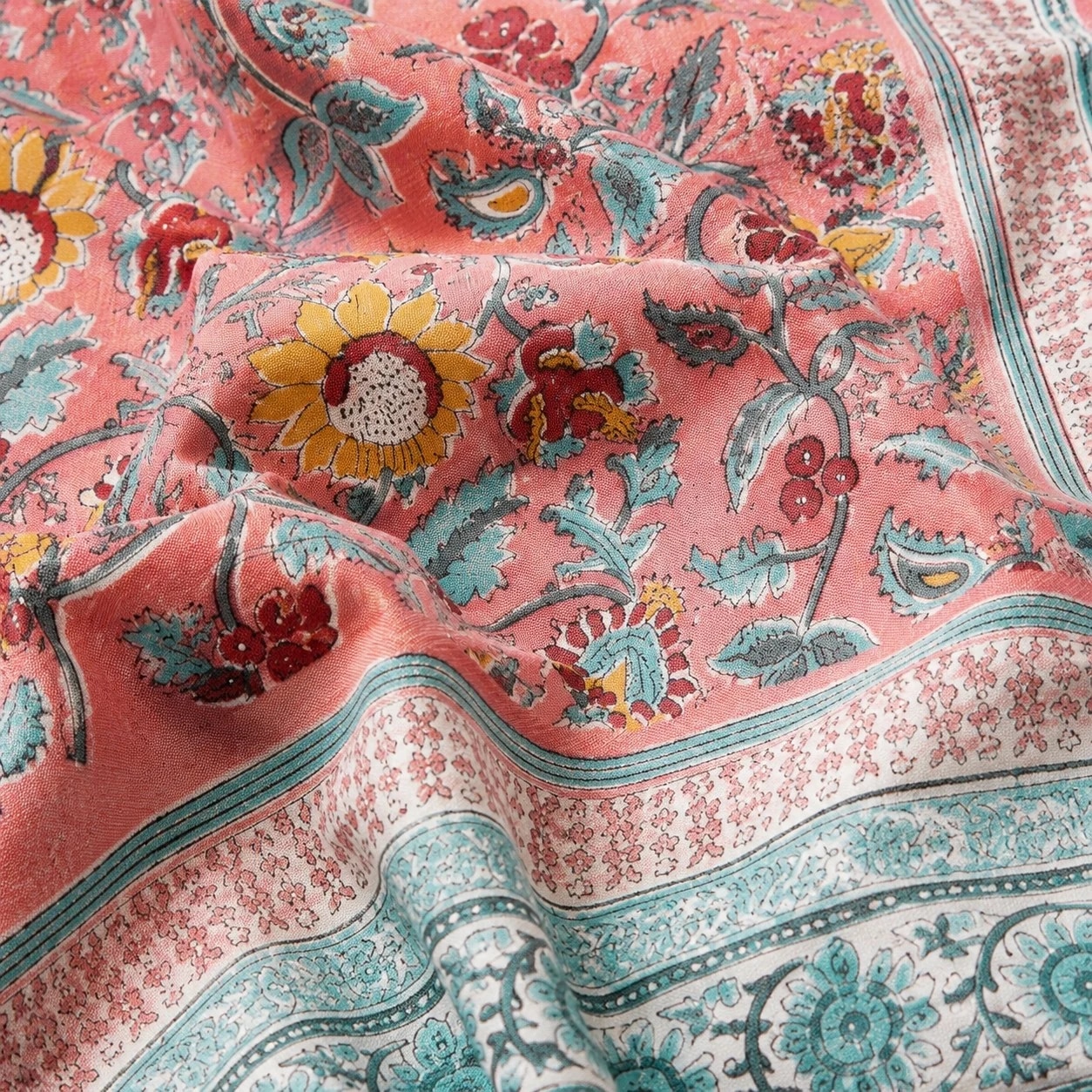 Close detail of pink garden floral border and fabric texture