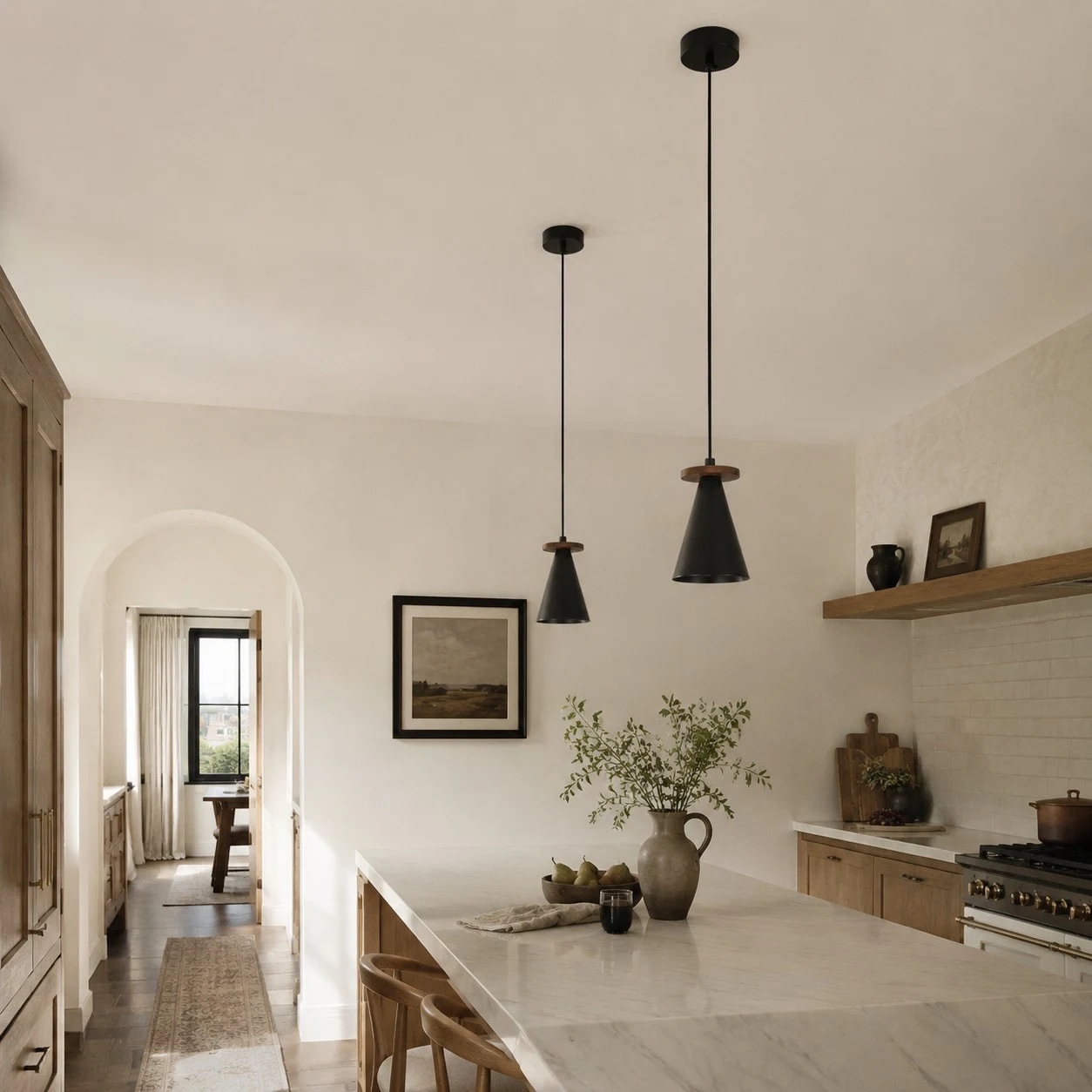 Black walnut pendant lights installed above a kitchen island