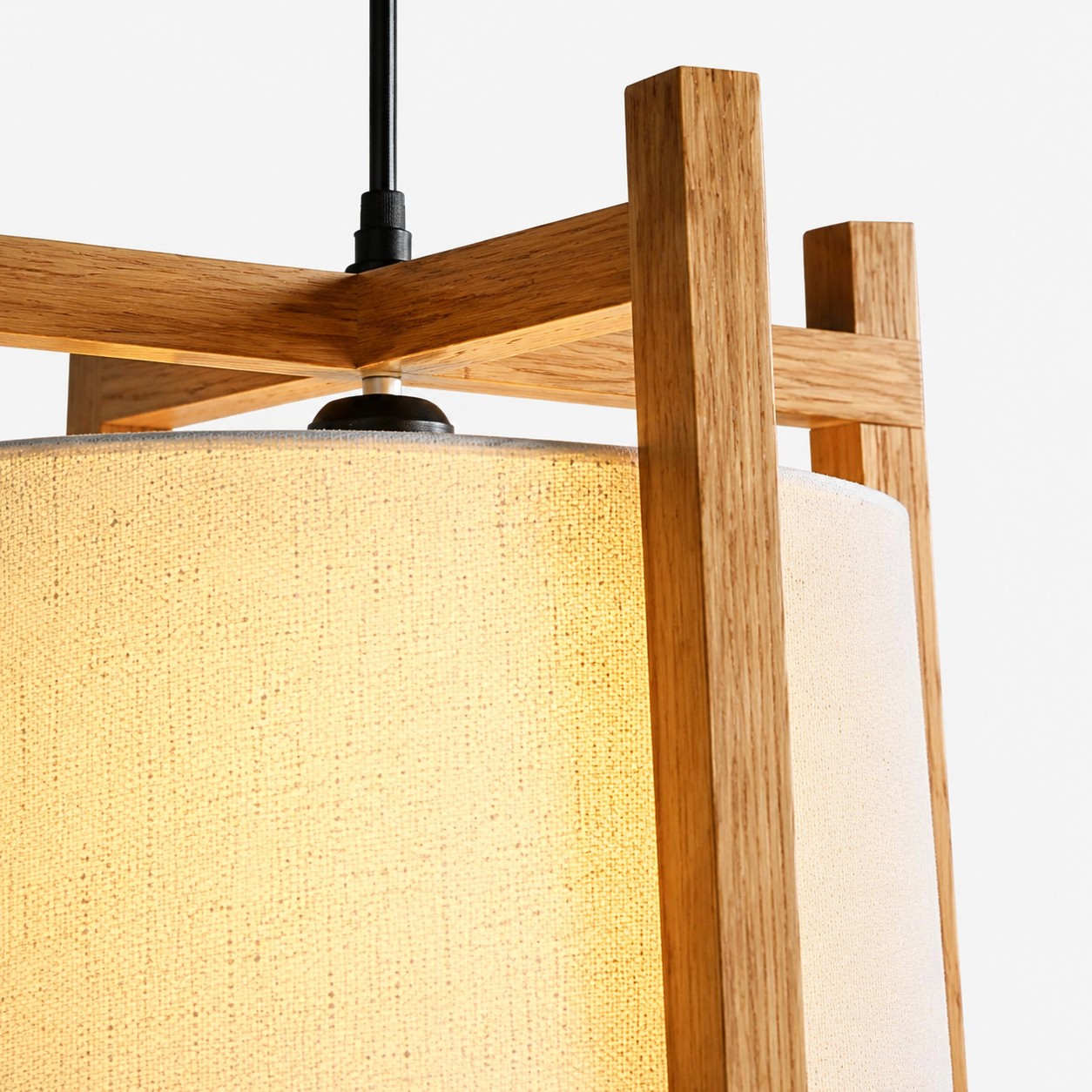 Close-up of natural wood finish frame and fabric shade texture