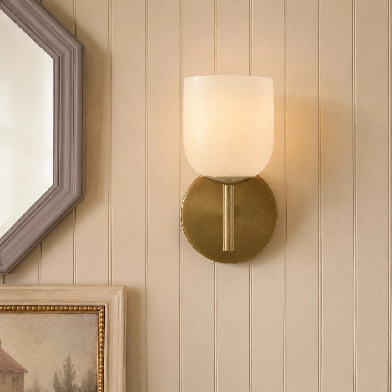 Marble wall sconce in an entryway setting