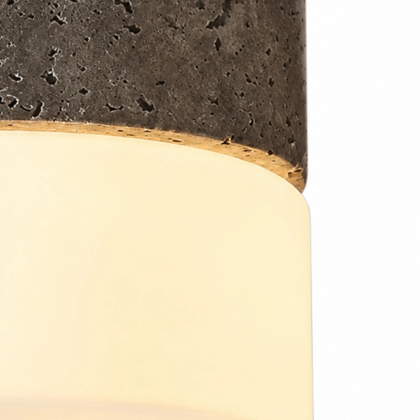 Close detail of stone edge and glass shade joint